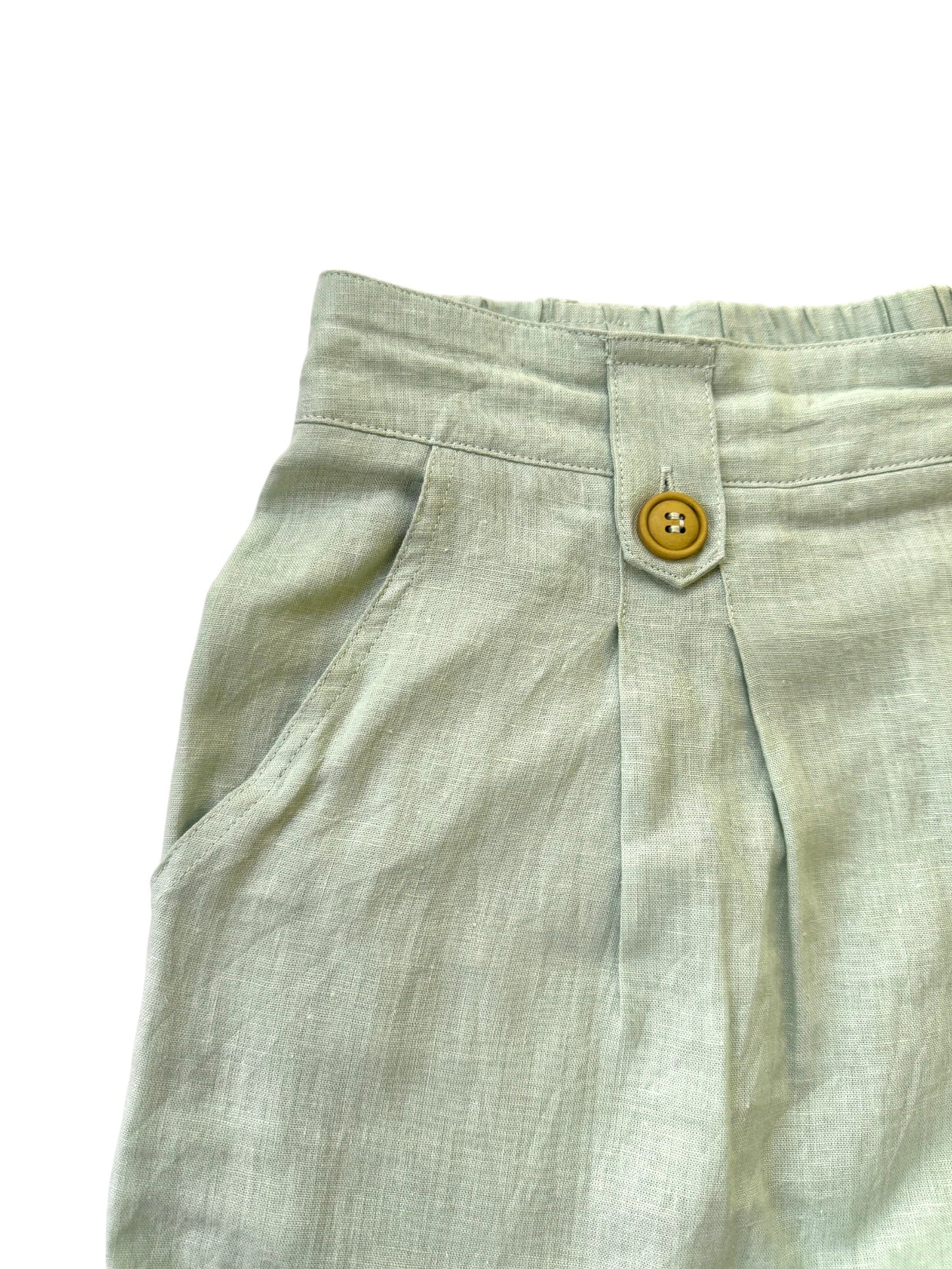 HAVEN Pastel Green Pleated Linen Shorts – Relaxed Fit with Garter Back